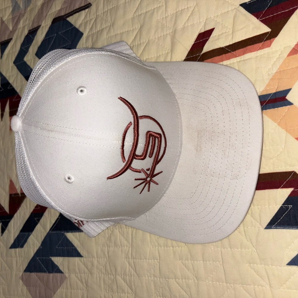 White and rose gold Spin ‘Em hat